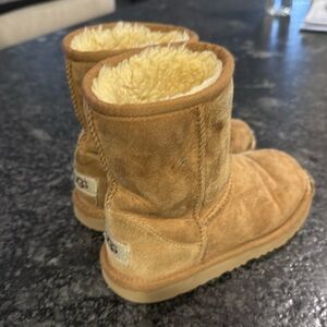 Kids size 13 UGG boot